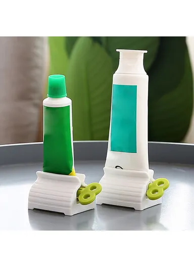 Rolling Tube Toothpaste Squeezer Vertical Toothpaste Seat Holder Stand Rotate Toothpaste Dispenser for Bathroom